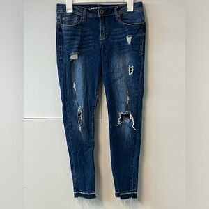 Women’s American Rag factory distressed jeans. Size 9.
